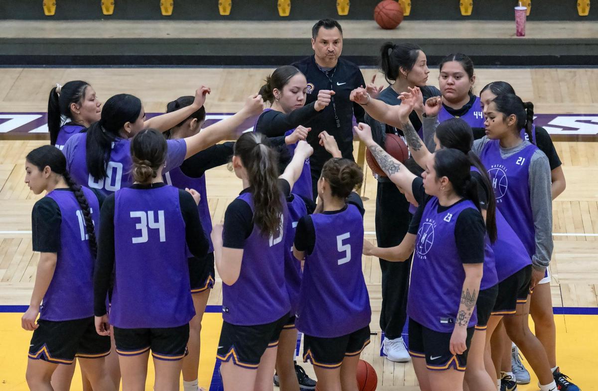 Coach Adam Strom, head coach of the Haskell Indian Nations University women’s basketball team, runs practice at the school’s gym. Strom is working without pay following his being fired as part of the Trump Administration’s orders to reduce the federal workforce.