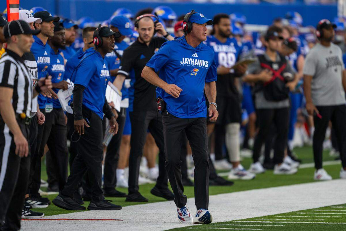 Kansas Jayhawks head coach Lance Liepold runs along the sideline in the first half of the Jayhawks game vs. the Fresno State Bulldogs on Saturday, Aug. 23, 2025, at David Booth Kansas Memorial Stadium, in Lawrence.