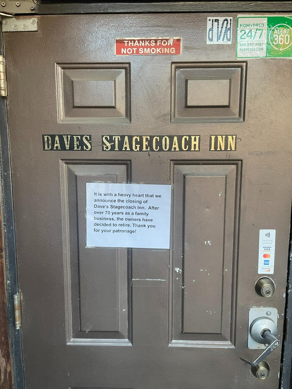 A sign posted to the door at Dave’s Stagecoach Inn on Thursday announces that the bar has closed and the owners are retiring.