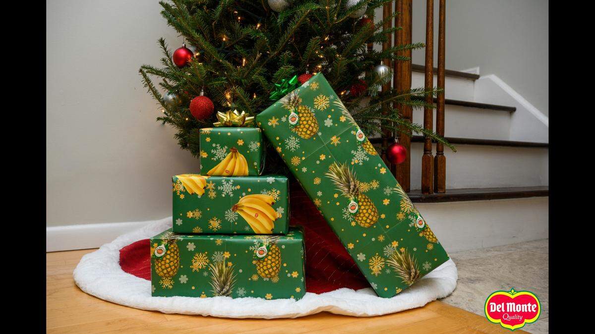 Del Monte is giving away free pineapple- and banana-scented wrapping paper on Thursday.