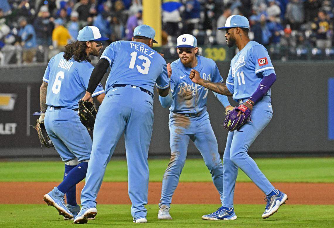 Kansas City Royals players Maikel Garcia (11), Bobby Witt Jr. (7), Jonathan India (6) and Salvador Perez (13) celebrate after beating the Houston Astros at Kauffman Stadium on Apr 26, 2025 in Kansas City, Missouri, USA.