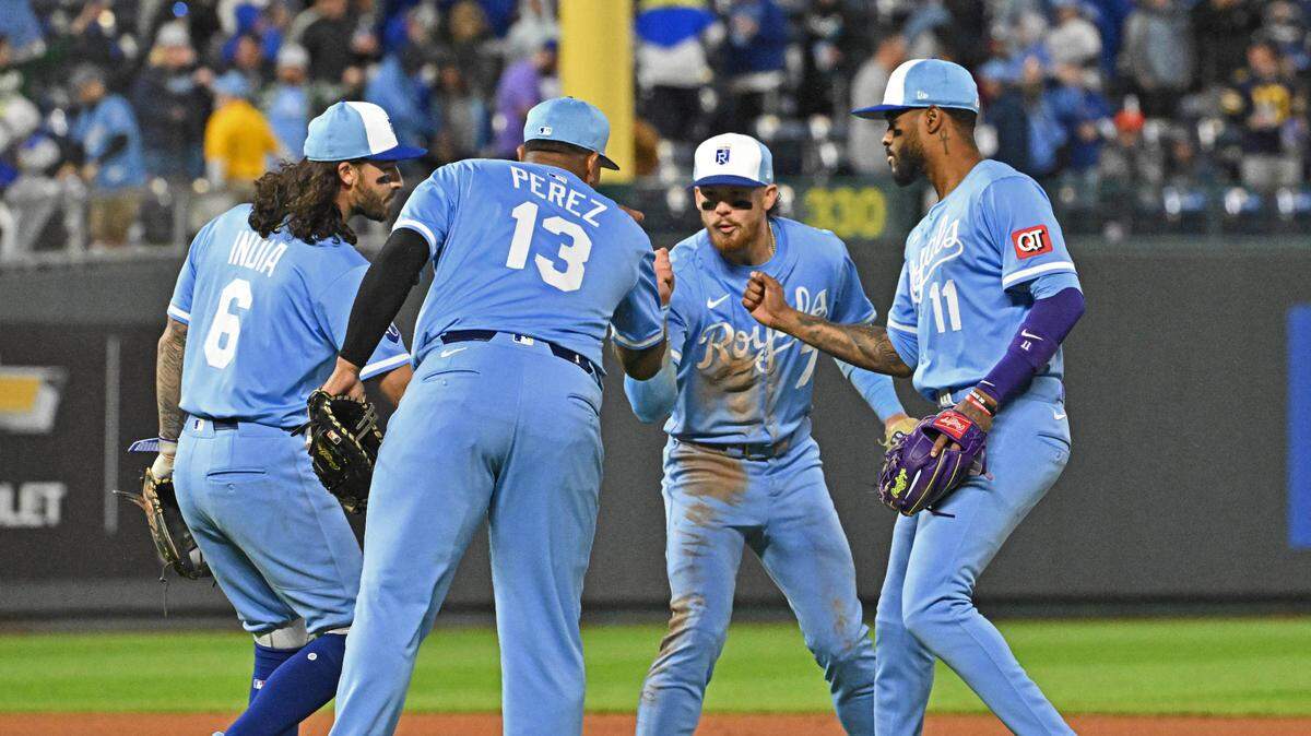 Kansas City Royals players Maikel Garcia (11), Bobby Witt Jr. (7), Jonathan India (6) and Salvador Perez (13) celebrate after beating the Houston Astros at Kauffman Stadium on Apr 26, 2025 in Kansas City, Missouri, USA.