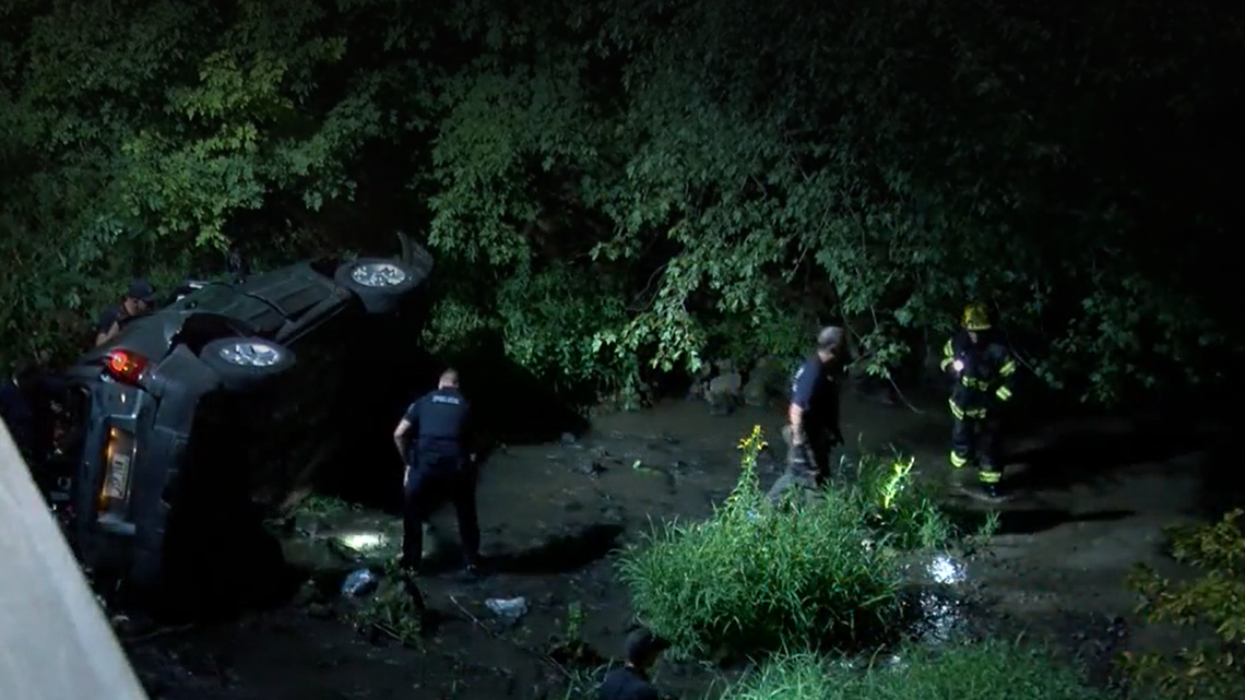 An SUV crashed into a bridge and landed on its side in a creek in Davenport, Iowa, killing a 31-year-old and 12-year-old, injuring 3 other children, cops said.