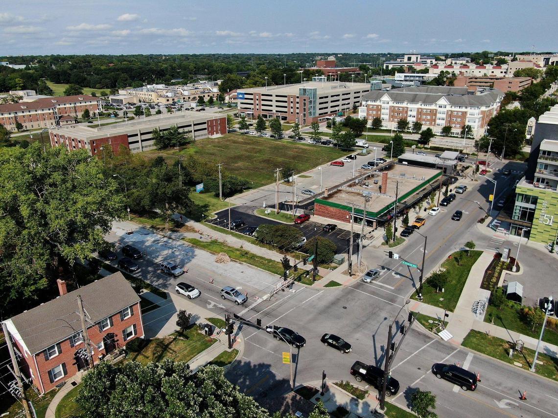 The southernmost terminal is the University of Missouri-Kansas City stop at Brookside Boulevard and 51st Street. The university, top right, sits to the east of the intersection. Infrastructure work continues on the streetcar expansion. Many residents of the South Plaza neighborhood are concerned that added taxes will price them out of their homes.