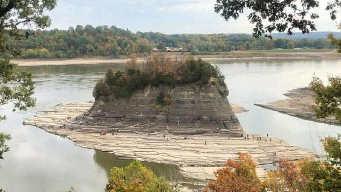 Visitors are seen at Tower Rock, a formation typically only reachable by boat.