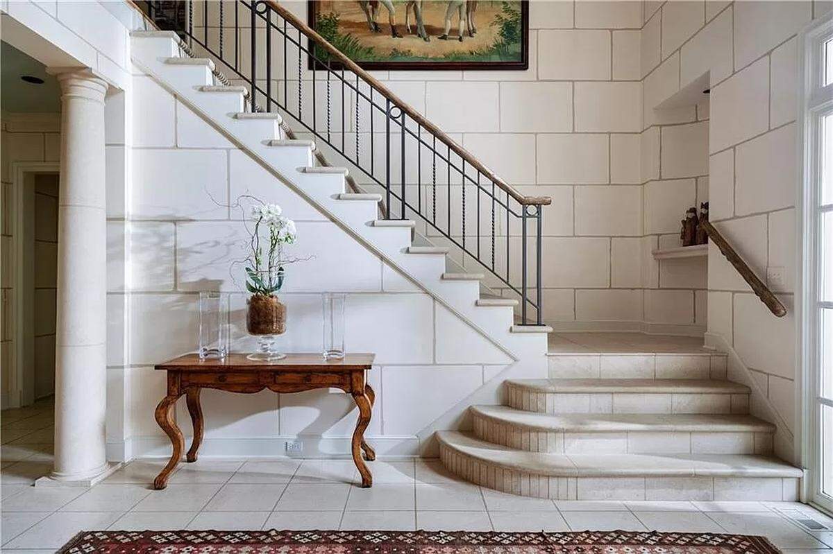 The foyer welcomes visitors to the 11,000 square foot home at 2404 W. 114th St. The Leawood house was listed for $4.5 million on Zillow in June.