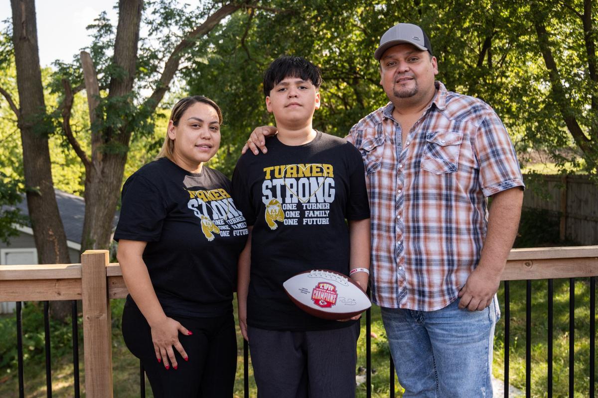 Samuel Arellano and his parents, Antonio and Abigail Arellano, at their home on Aug 28, 2024. Samuel was struck by gunfire at the Chiefs Super Bowl Celebration at Union Station. Samuel is an avid Chiefs fan and after the shooting, he received a signed football from Chiefs QB Patrick Mahomes. (082824)