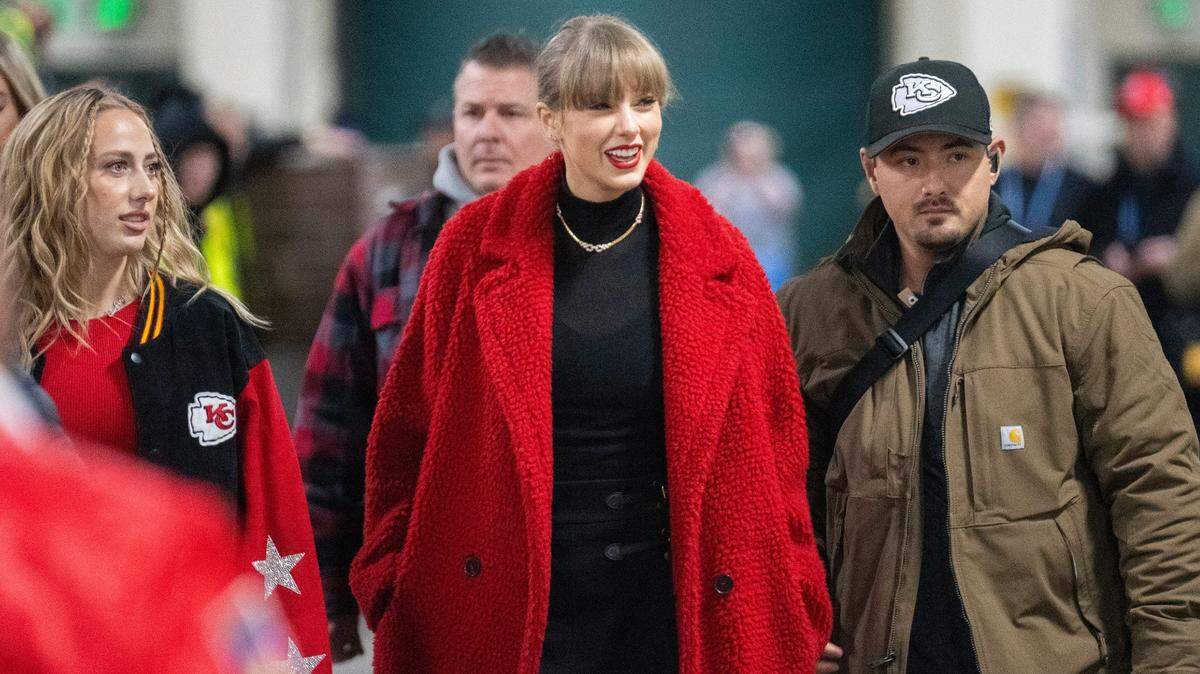 Capt. Daniel Graves of the Kansas City Police Department - seen here in the red plaid jacket - is the husband of KCPD Chief Stacey Graves. He was seen alongside singer Taylor Swift when she attended the Chiefs game Sunday in Green Bay, Wisconsin.