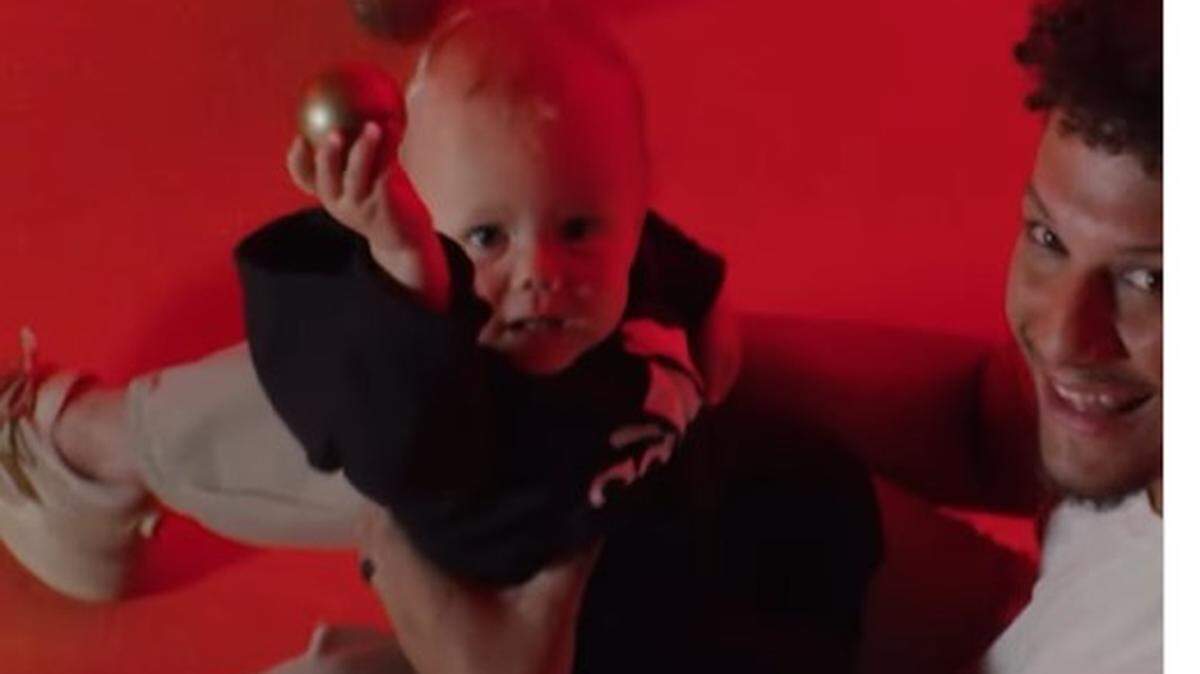 Chiefs quarterback Patrick Mahomes with his son, Bronze, in a video from Adidas.