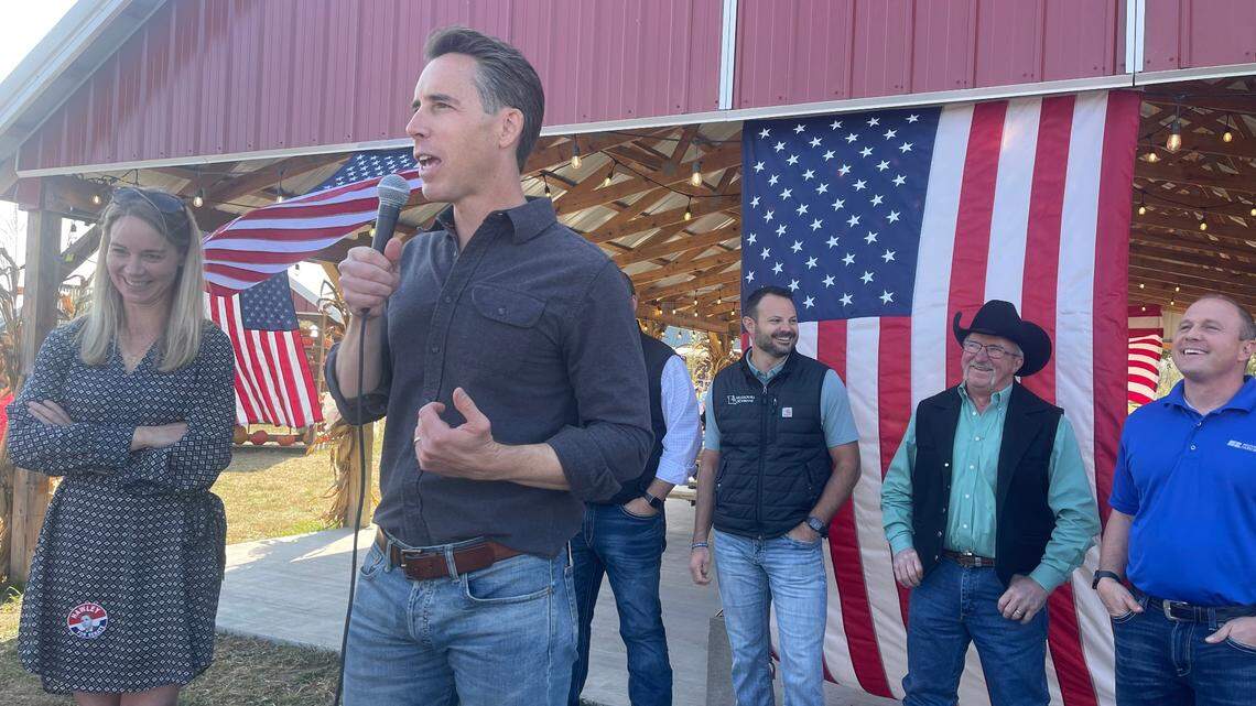 U.S. Sen. Josh Hawley of Missouri speaks at a campaign event in Jefferson City on Oct. 24, 2024. He stood with his wife, Erin, left. Hawley spoke at the event along with representatives from Missouri agriculture groups such as the Missouri Farm Bureau and the Missouri Corn Growers Association.