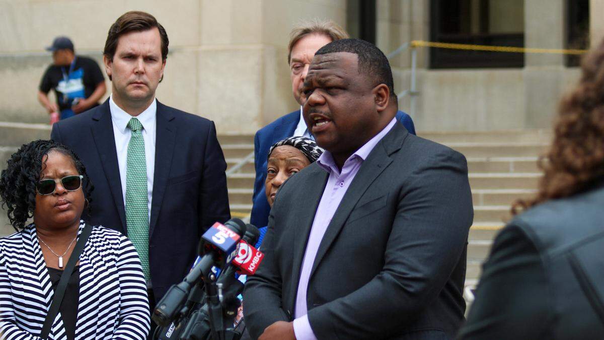 Harry Daniels, a national civil rights attorney, addresses media at the Wyandotte County Courthouse after the family of Charles Adair saw body camera footage of his in-custody death for the first time.