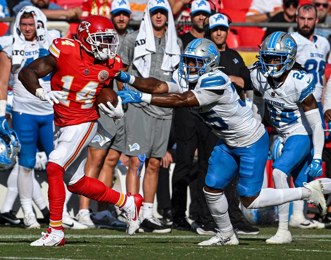 Kansas City Chiefs wide receiver Cornell Powell (14) breaks away from Detroit Lions safety Chelen Garnes (35) on his way to a touchdown Saturday in the second half of the game.