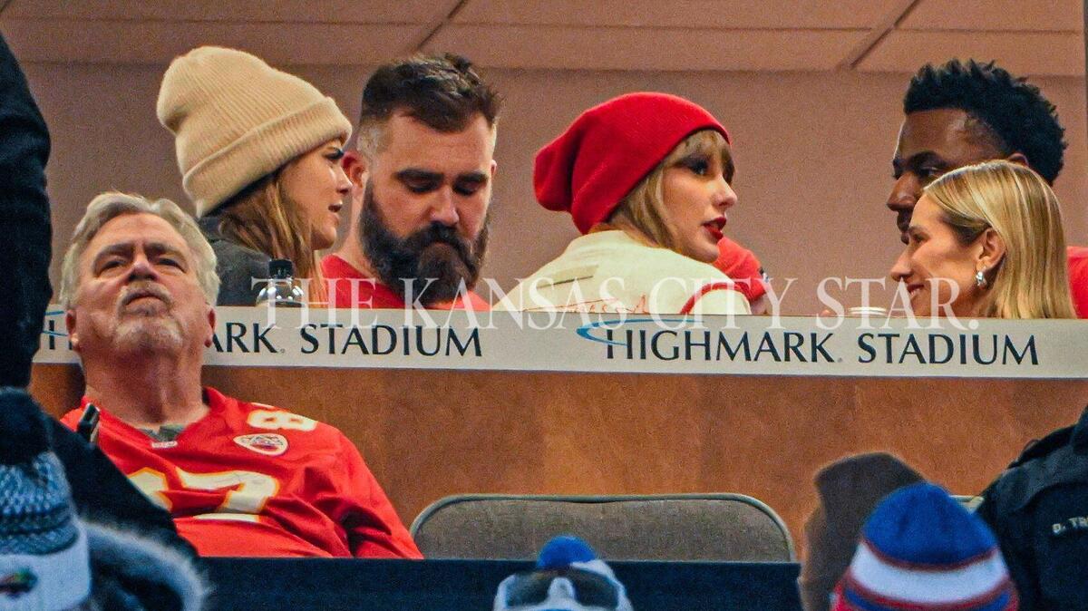 Taylor Swift, in the middle, watched the Chiefs-Bills game Sunday from a suite at Highmark Stadium surrounded by relatives of her boyfriend Travis Kelce, and longtime members of her own squad.