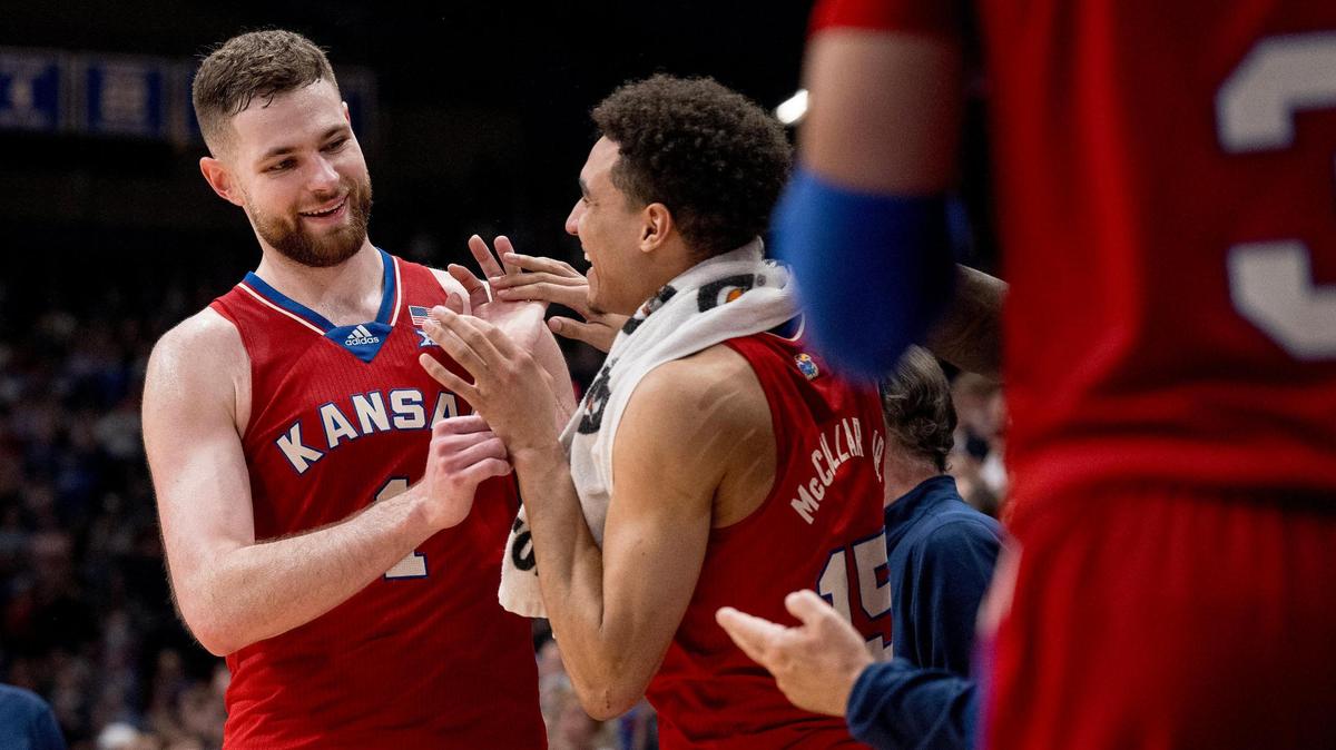 Kansas Jayhawks center Hunter Dickinson (1) celebrates with guard Kevin McCullar Jr. (15) during an NCAA college basketball game against the Kansas State Wildcats on Tuesday, March 5, 2024, in Lawrence.