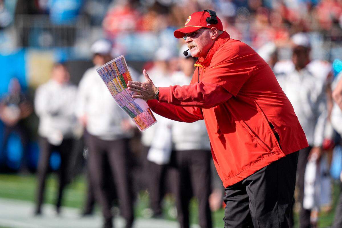 Kansas City Chiefs head coach Andy Reid yells out to his offense during the second quarter against the Carolina Panthers at Bank of America Stadium.