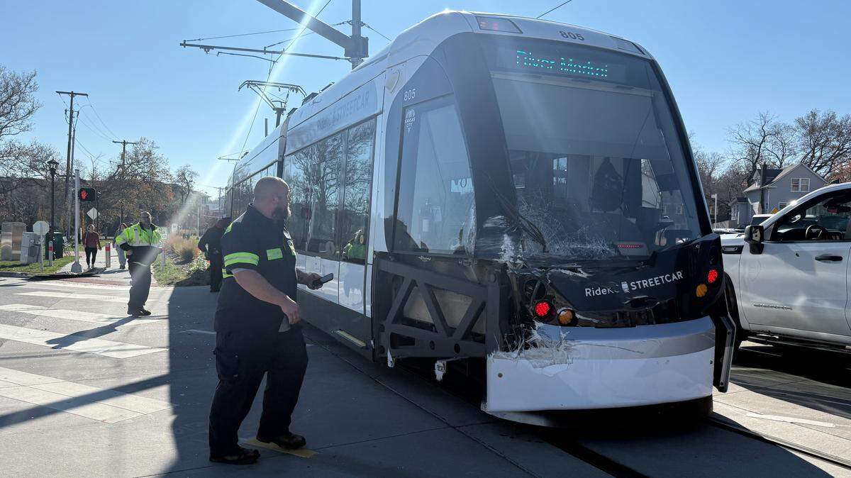A Kansas City Streetcar is seen with its front windshield shattered and its front right bumper ripped off after a collision with a box truck Saturday.