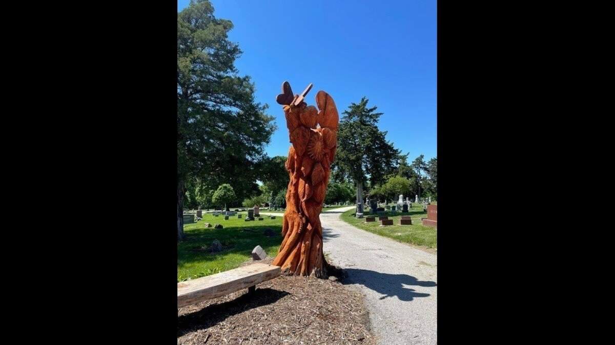 The Olathe Cemetery Memorial Tree, carved from a dormant elm, is a symbol of life past and present. The sculpture, which stands along a path in the cemetery, is a gift from the city’s public art program.