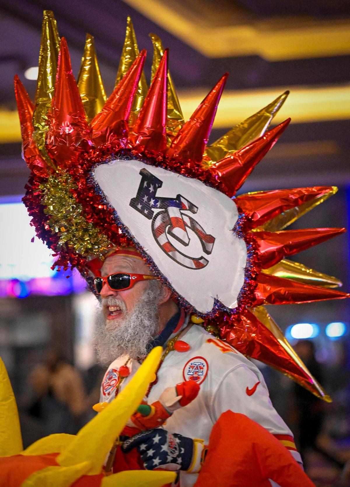Don Lobmeyer, who donned his “Chiefs Santa Ma Ho Ho Homes,” outfit complete with an inflatable red dragon, to honor the Lunar New Year and the Chiefs, as he walked through a casino on Saturday, Feb. 10, 2024, in Las Vegas. Lobmeyer, 55, is a retired Army National Guardsman from Wichita, Kansas, who has traveled Super Bowl LVII and to Germany last fall when the Chiefs took on the Dolphins.