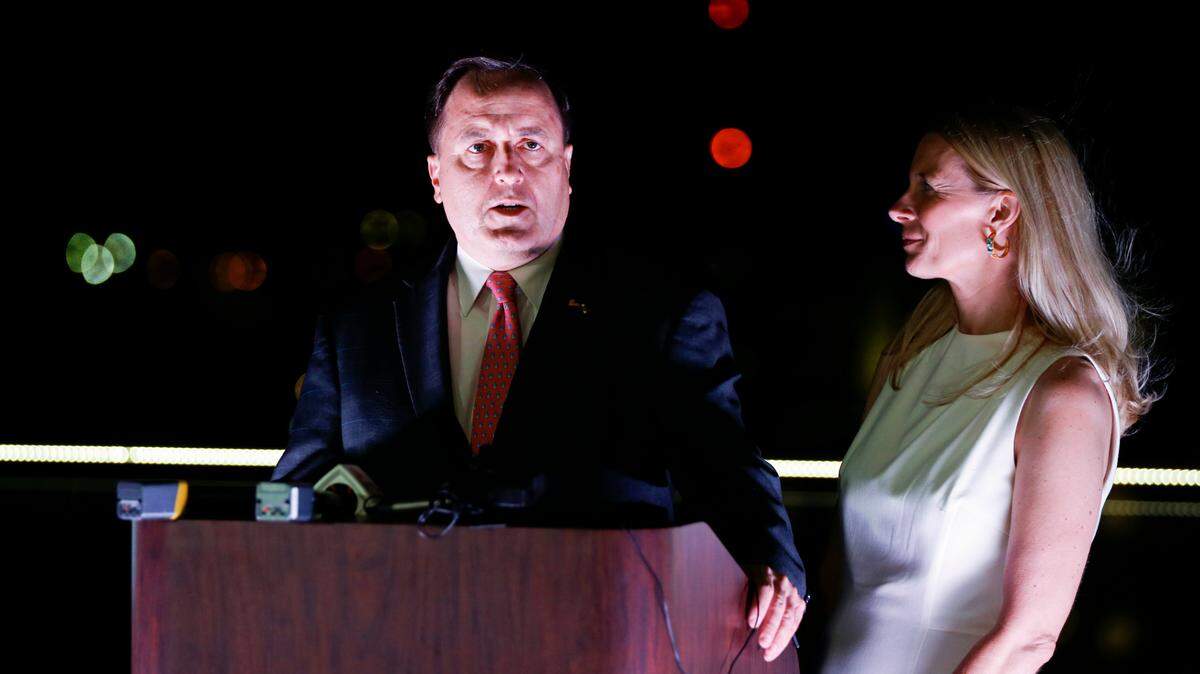 Missouri Republican gubernatorial candidate Jay Ashcroft, flanked by his wife Katie, addresses his supporters and congratulates probable Republican nominee Mike Kehoe during a watch party at the Moxy hotel in Downtown Springfield on Tuesday, Aug 6, 2024.