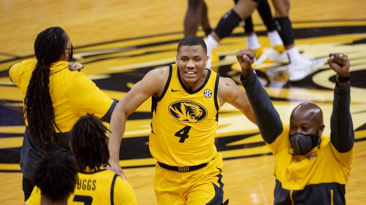 Missouri’s Javon Pickett celebrates with teammates after Missouri defeated Illinois 81-78 Saturday, Dec. 12, 2020, in Columbia, Mo.