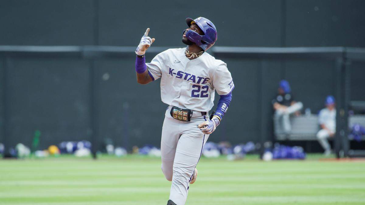 Kansas State Wildcats infielder Kaelen Culpepper (22) points up after hitting a home run during the game against the Oklahoma State Cowboys at O’Brate Stadium on May 13, 2023.