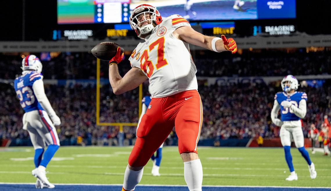 Kansas City Chiefs tight end Travis Kelce (87) celebrates a touchdown against the Buffalo Bills during an AFC Divisional Round playoff game at Highmark Stadium on Sunday, Jan. 21, 2024, in Orchard Park, New York.