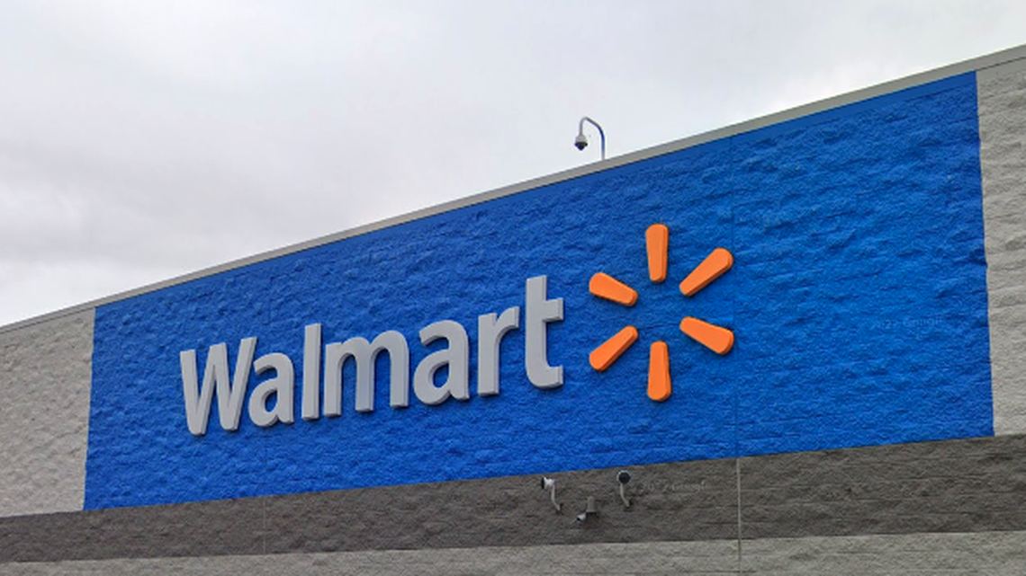 A woman was arrested after police say she left her toddlers in a hot car for more than 30 minutes as she shopped at Walmart.