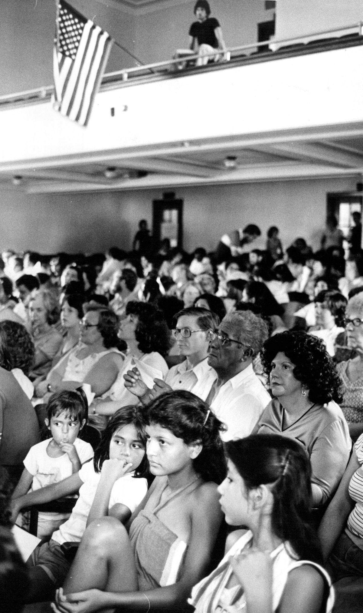 Westside residents gather in the West High auditorium on Aug. 11, 1980.