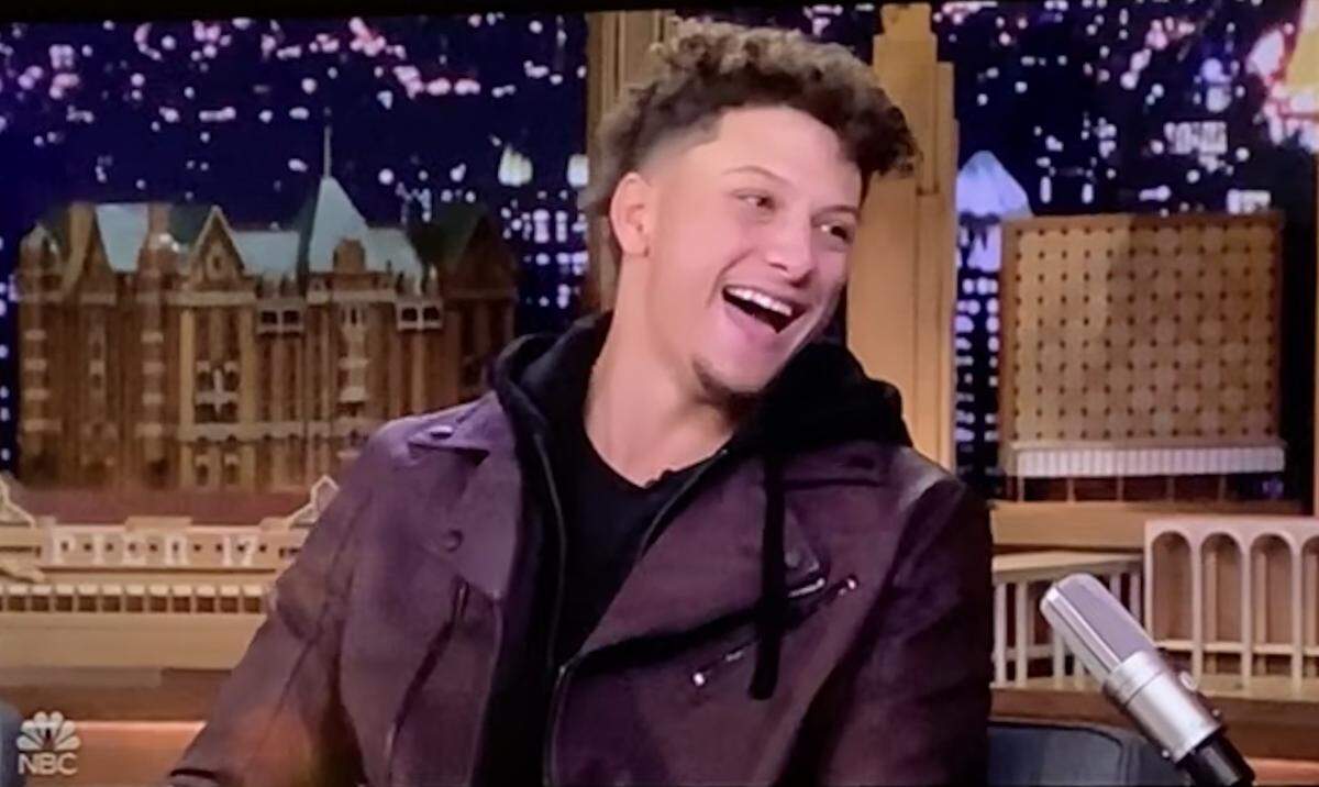 Patrick Mahomes shares a laugh with host Jimmy Fallon on The Tonight Show late Monday night in New York.