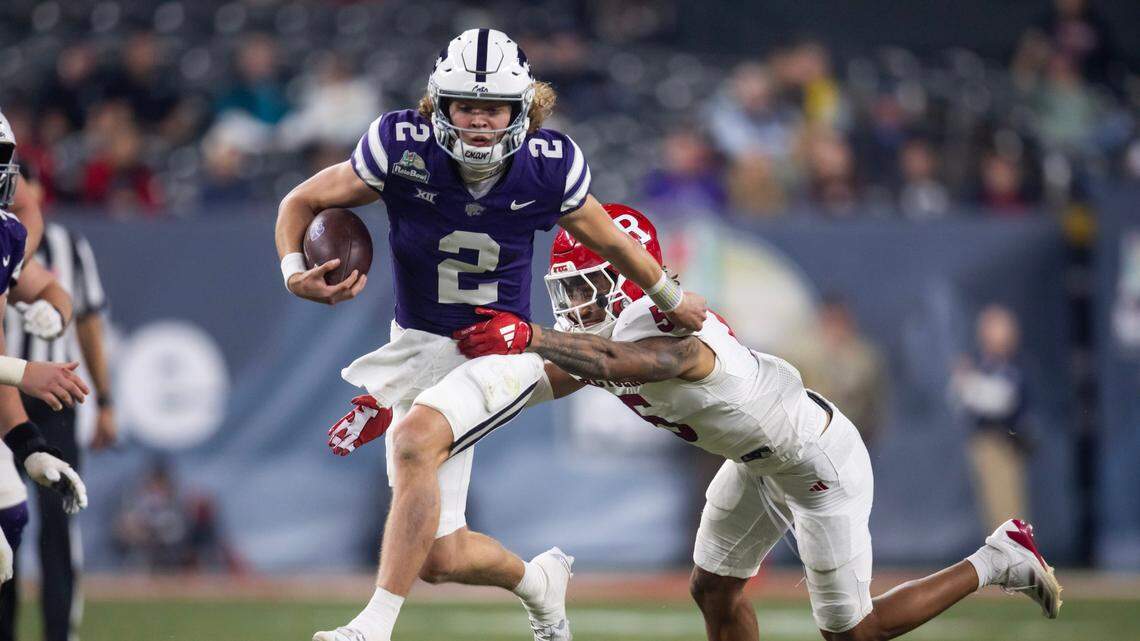 Kansas State Wildcats quarterback Avery Johnson (2) runs the ball against the Rutgers Scarlet Knights during the second half of the Rate Bowl at Chase Field on Dec. 26, 2024.