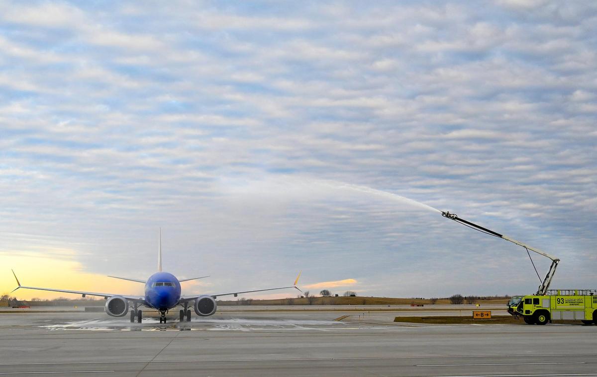 A water cannon greeted a Southwest Airlines jet, the first flight to land at the new $1.5 billion single terminal on Tuesday, Feb. 28, 2022, at Kansas City International Airport.