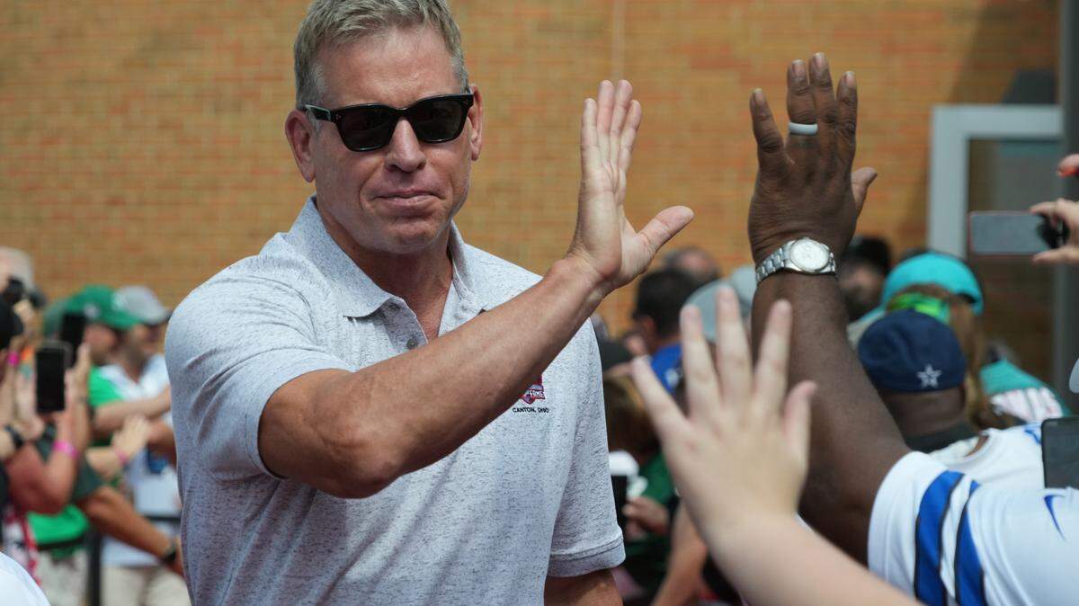 Troy Aikman arrives on the red carpet for the 2023 Pro Football Hall of Fame Enshrinement at Tom Benson Hall of Fame Stadium.