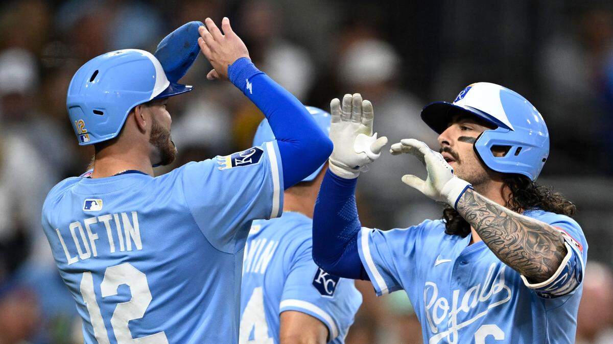 Kansas City Royals third baseman Jonathan India (6), right, is congratulated by Nick Loftin (12) after hitting a three-run home run during the fifth inning against the San Diego Padres at Petco Park on June 20, 2025, in San Diego.