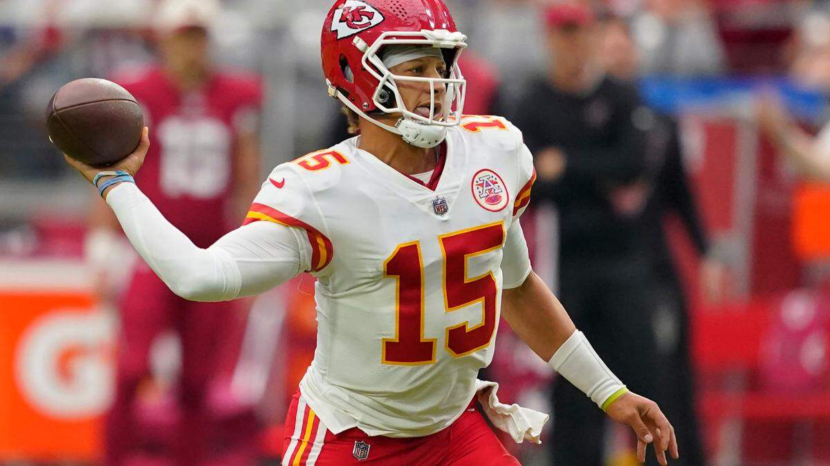 Kansas City Chiefs quarterback Patrick Mahomes (15) throws against the Arizona Cardinals during the first half of an NFL football game, Sunday, Sept. 11, 2022, in Glendale, Ariz.
