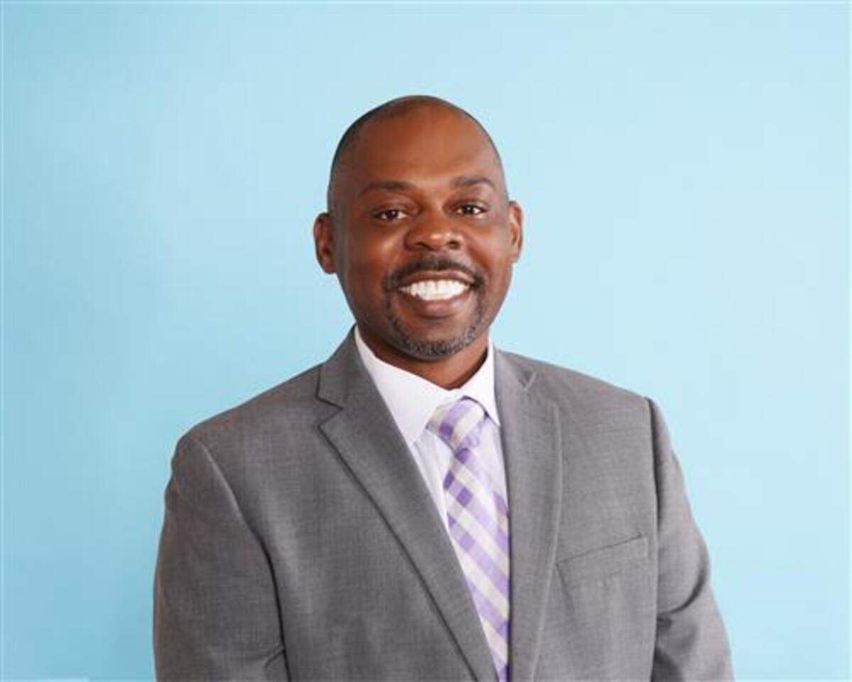 Yaw Obeng, superintendent of schools in the Hickman Mills district, is offering students his own money for good grades and good behavior.