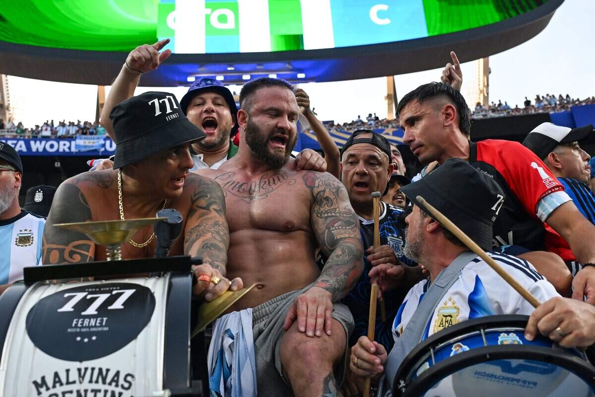 Argentina fans celebrate with drums in the stands at the Argentina vs. Algeria FIFA World Cup group-stage soccer match at Kansas City (Arrowhead) Stadium in Kansas City on Tuesday, June 16, 2026.