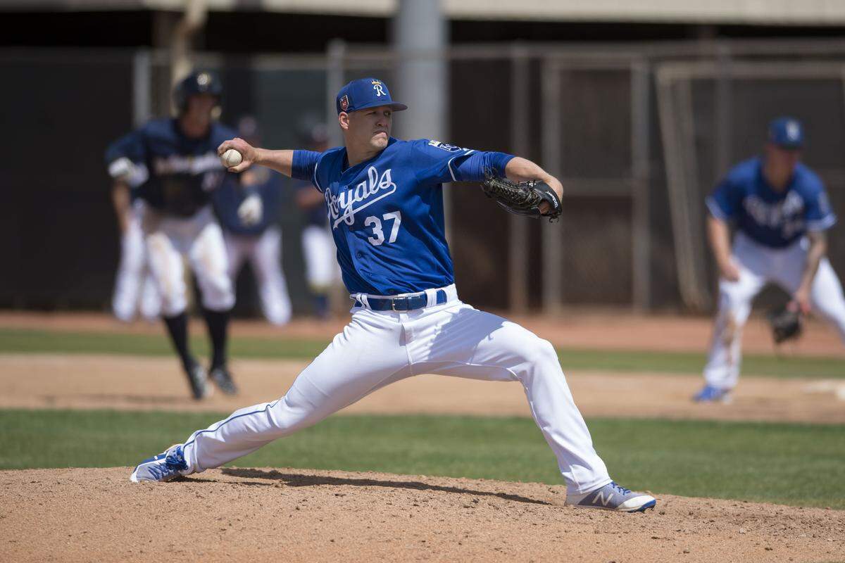 Kansas City Royals relief pitcher Bryan Brickhouse (37) throws from the mound during a Minor League Spring Training game against the Milwaukee Brewers at Maryvale Baseball Park on March 25, 2018, in Phoenix, Arizona.