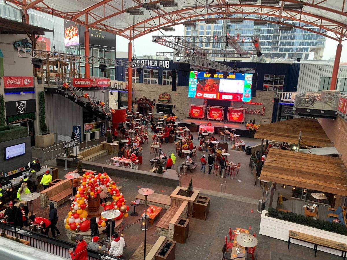 About 90 minutes before the Chiefs faced the Buccaneers in the Super Bowl, several dozen people gathered downtown at the KC Live! venue, some hauling large blankets in with them.