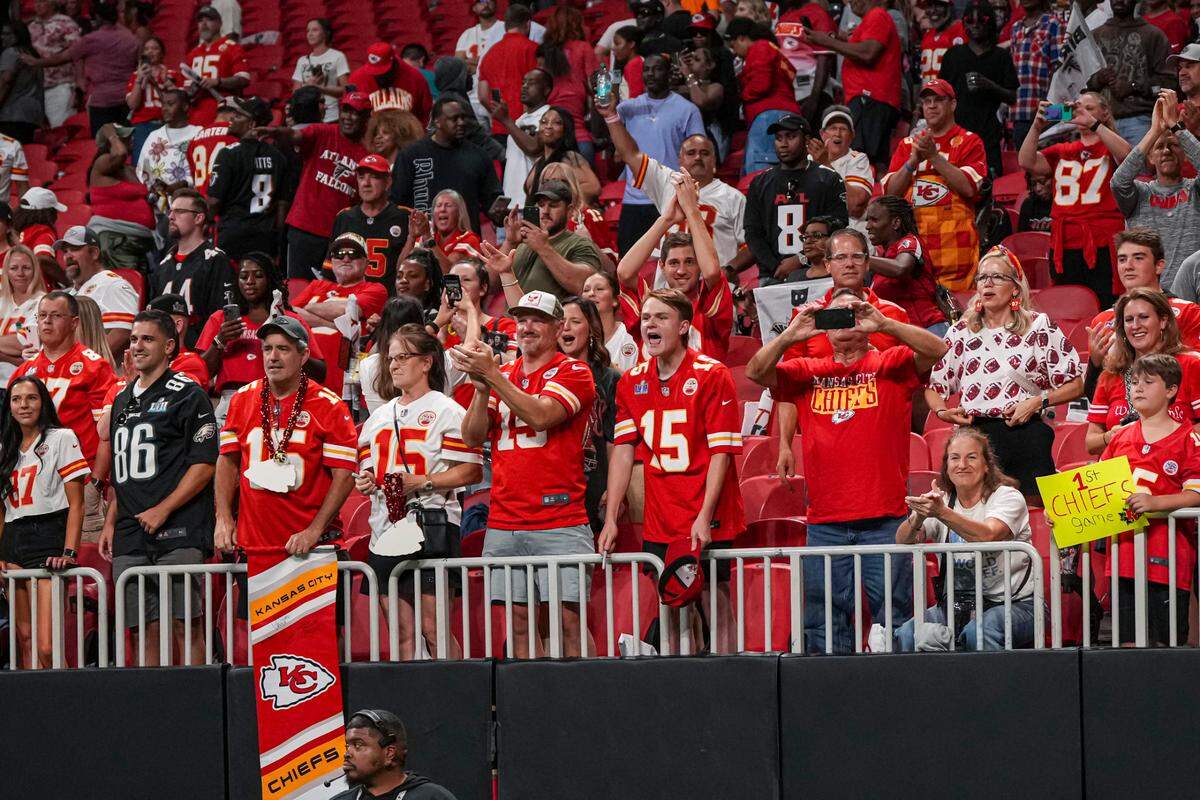 Kansas City Chiefs fans react after the Chiefs defeated the Atlanta Falcons at Mercedes-Benz Stadium.