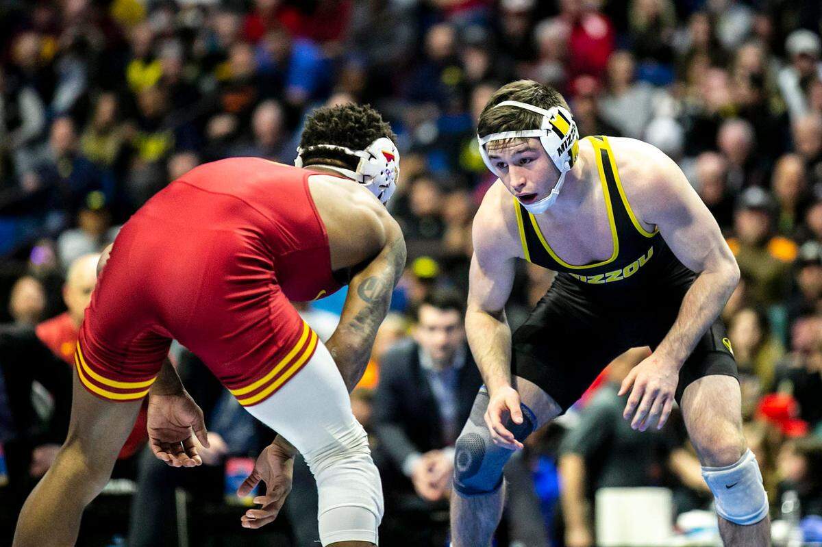 Missouri’s Keegan O’Toole, right, wrestles Iowa State’s David Carr at 165 pounds in the finals during the sixth session of the NCAA Division I Wrestling Championships, Saturday, March 18, 2023, at BOK Center in Tulsa, Okla.