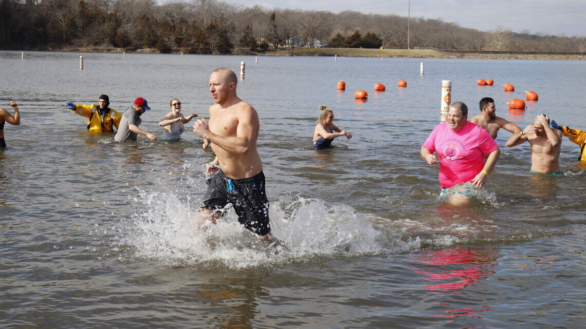 Warm hearts, cold bodies: Plunge into the icy waters of Lake Olathe for this cause