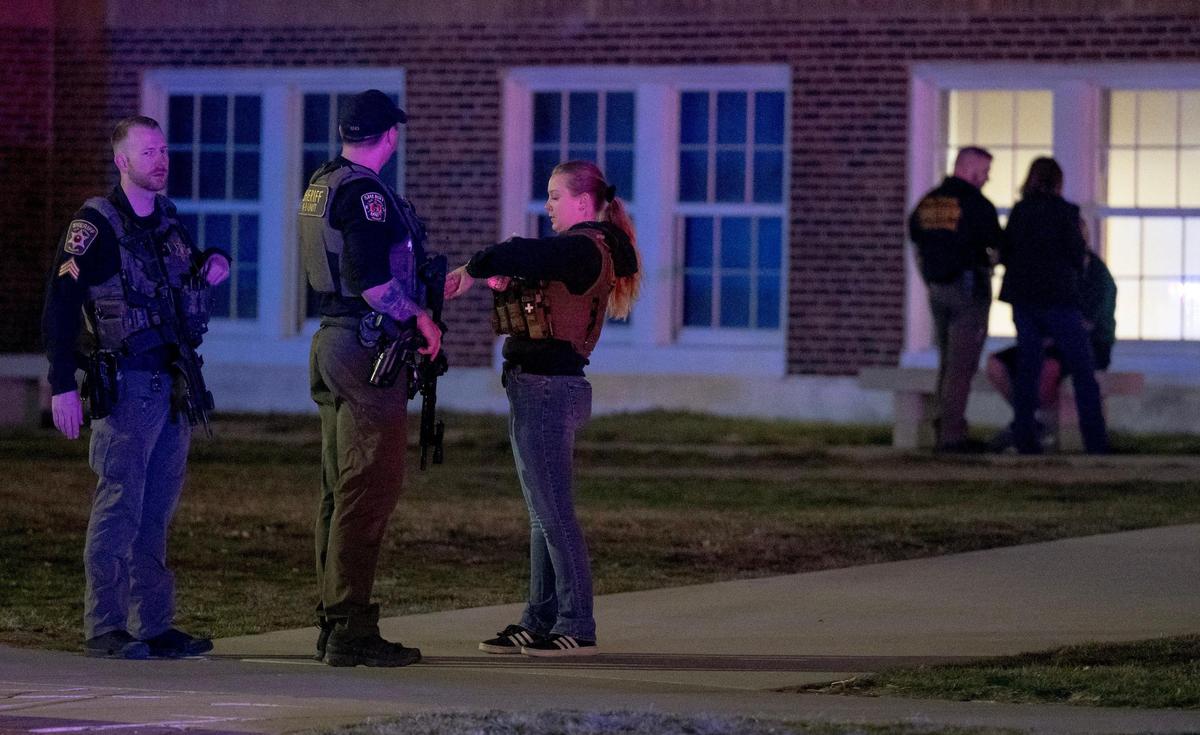 Law enforcement officials work the scene of a shooting outside of North Kansas City High School on Saturday, March 2, 2024, in North Kansas City.