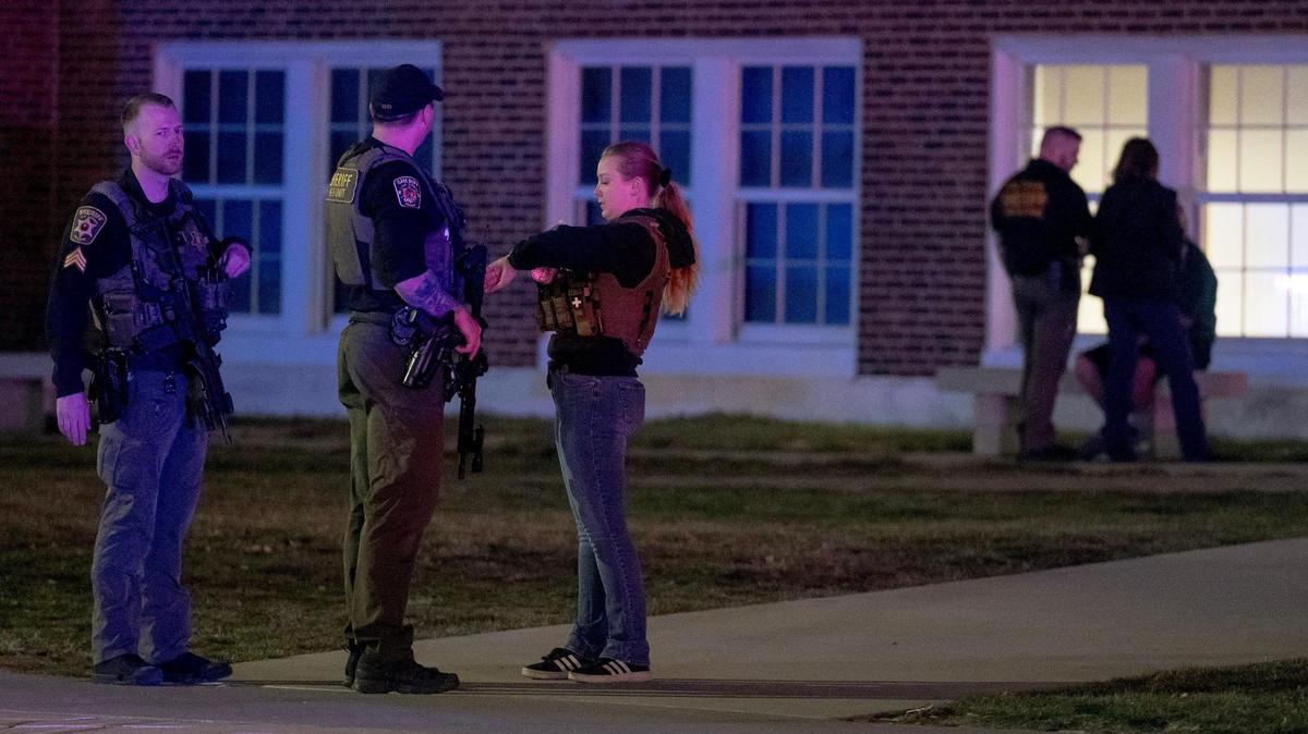 Law enforcement officials work the scene of a shooting outside of North Kansas City High School on Saturday, March 2, 2024, in North Kansas City.