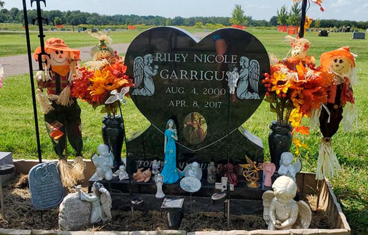 After being bulled for months, Riley Garrigus, 16, a sophomore at Smith-Cotton High School in Sedalia, Missouri, took her own life with a handgun on April 8, 2017. Her family buried Riley at Crown Hill Cemetery, where they often decorate her grave.