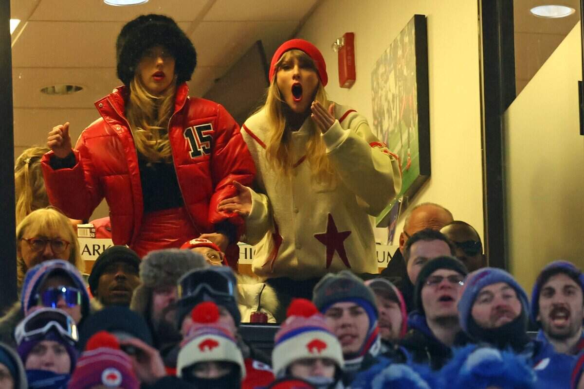 On Jan 21, 2024, Taylor Swift (right) and Brittany Mahomes react after Kansas City Chiefs tight end Travis Kelce (not pictured) scores a touchdown in the 2024 AFC divisional round game between against the Buffalo Bills at Highmark Stadium.