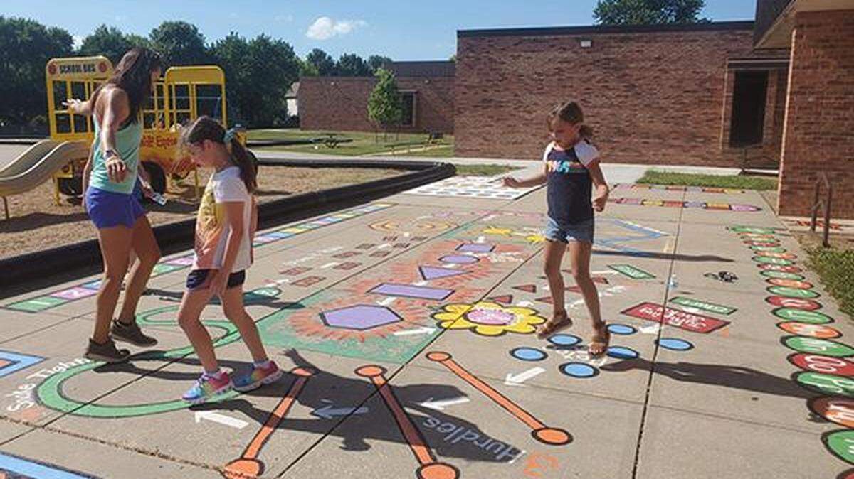 This colorful new playground became a fun place to play at Tomahawk Elementary School in Olathe.