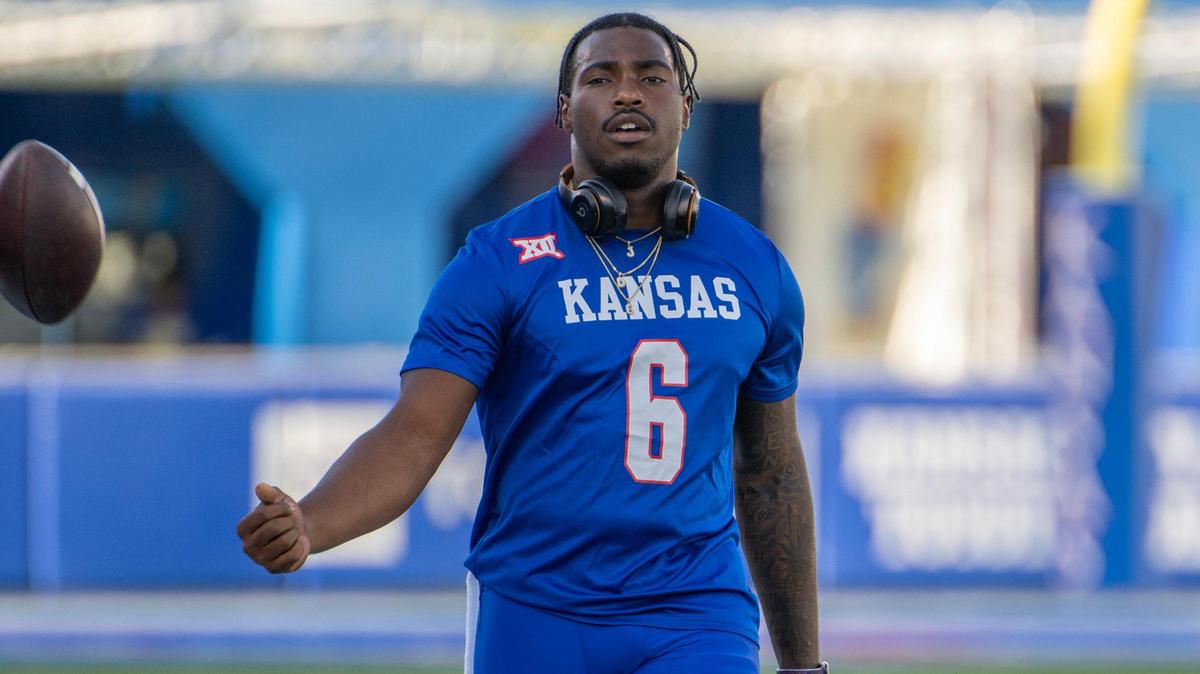 Kansas Jayhawks quarterback Jalon Daniels (6) warms up before the season opener against the Missouri State Bears at David Booth Kansas Memorial Stadium on Friday, Sept. 1, 2023, in Lawrence, Kan.