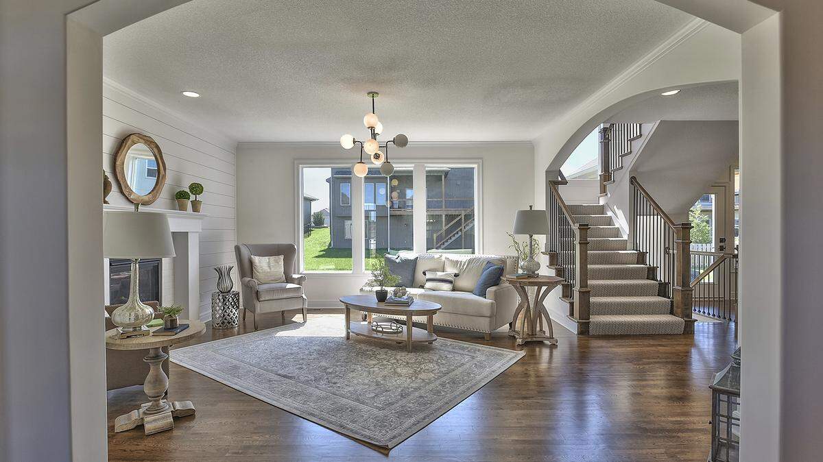 Stonebridge Trails offers 3 beautiful homes on the Fall Parade, including Chris George Homes’ Yorkshire V. This classic 2-story plan features a spacious Great Room and kitchen with 9-foot long island, offering ample space for families and friends to gather. An office/bedroom is located on the main floor, while another 4 bedrooms and 3 baths are situated upstairs. 