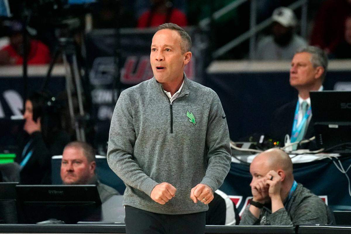 North Texas head coach Grant McCasland watches from the sideline during the first half of an NCAA college basketball game against Louisiana Tech in the semifinal round of the Conference USA tournament in Frisco, Texas, Friday, March 11, 2022. (AP Photo/LM Otero)