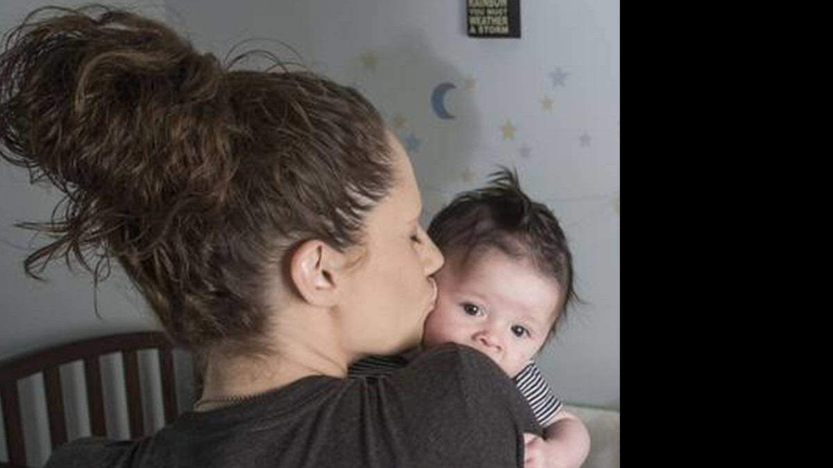 Surrounded by memories of Madden, who died in 2012, Amanda Pickman of Kansas City kissed son Malachi in their bedroom. Officially, Madden died of positional asphyxia. Pickman believes the cause was SIDS.